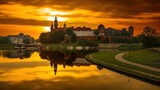 Fototapeta  - Zamek Królewski na Wawelu o wschodzie słońca ze złotym niebem w tle