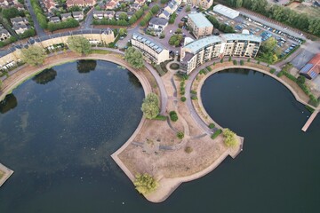 Aerial View of Caldecotte Lake at Sunset, A beautiful lake split across 2 sides, drone's high angle footage of People and Landscape of England UK