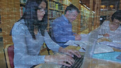 Sticker - Animation of binary code over multiracial students studying while sitting in library