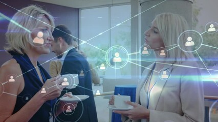 Poster - Animation of network of profile icons over two caucasian businesswomen discussing at office