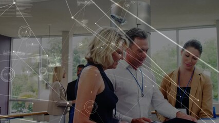 Poster - Animation of network of connections over group of diverse businesspeople discussing at office