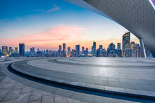 Empty Floor And Modern City Skyline With Building At Sunset In Shanghai, China.