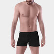 © olegphotor - Mockup of black male trunks front view, closeup, boxers on a posing guy, for design, pattern, branding.