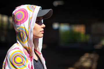 Wall Mural - Young female hip hop dancer standing in abandoned building on a sunny summer day