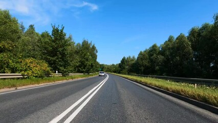 Wall Mural - Beautiful nature of Poland. The car is driving on the road to Poland. Interior view Elblag, POLAND, august 2022