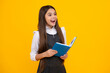 © Olena - Amazed teen girl. Teenager school girl with books isolated studio background. Excited expression, cheerful and glad.