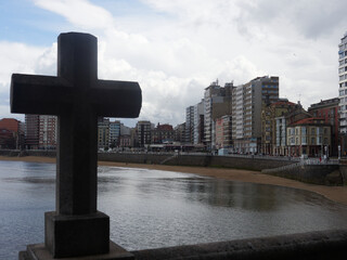 Cross in the foreground of a panorama