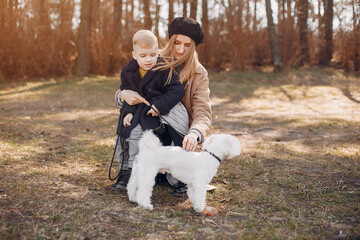 Mother with son playing in a summer park