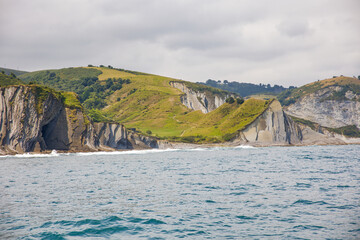 Wall Mural - the coastline of zumaia with the pilgrim way of saint james