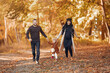 © prostooleh - Family with little daughter in a autumn park