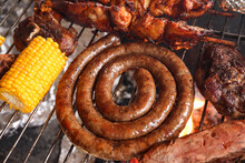 South African Braai. Braai Including Boerewors Sausage, Lamb Chops And Chicken Kebabs. Including Mielie Or Corn On The Cob