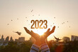 Leinwandbild Motiv New Year 2023 with hopes for peace and prosperity.