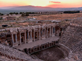 Fototapeta Mapy - Amphitheater in the ancient city of Hierapolis in the afternoon. Unesco Cultural Heritage Monument. Pamukkale, Turkey 15.07.2022