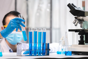 Wall Mural - health care researchers working in life science laboratory, medical science technology research work