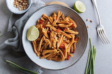 Sticker - Healthy pasta with tomatoes and pine nuts