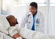 © Nina L/peopleimages.com - Healthcare doctor, insurance, and patient in bed talking of medical health surgery in hospital or clinic. Trust, care and help checkup by a happy, woman cardiologist worker consulting a sick person