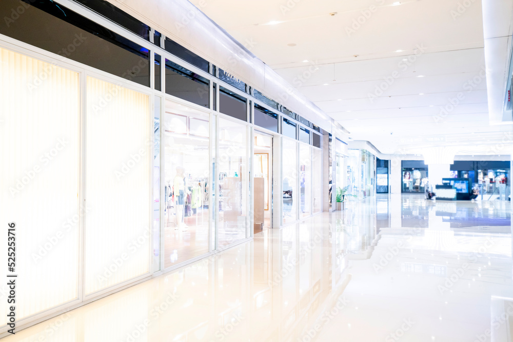 defocused shopping mall in department store interior for background ...