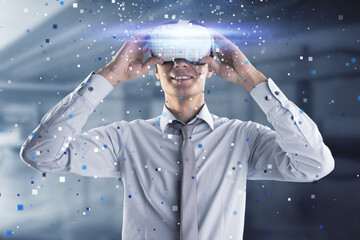 Aufkleber - Happy young european businessman with abstract hologram and VR glasses in blurry office interior. Augmented reality and cyberspace concept.