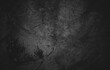 Slightly light black concrete cement texture for background. Dark grunge distressed with scratches, Scary dark walls overlay