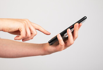 Poster - Woman hand swiping phone screen. Female receiving call, using smartphone applications, taking notes.
