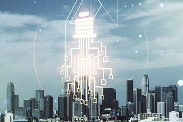 Poster - Double exposure of virtual creative light bulb hologram with chip on Los Angeles city skyscrapers background, idea and brainstorming concept