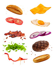 Delicious Burger With Floating Ingredients Separated On White Isolated Background. Cafe And Restaurant Advertisement.