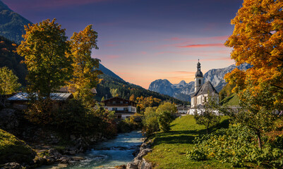 Amazing nature landscape. Famous St. Sebastian Parish Church during sunset in autumn at Berchtesgadener Land, Bavaria, Germany. Concept of an ideal resting place. Popular travel destination