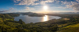 Fototapeta Na ścianę - aerial panorama of Caragh Lake in County Kerry with the sun setting over the lake