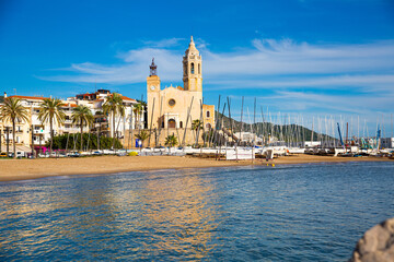 Wall Mural - view of church on coast of Sitges in Spain