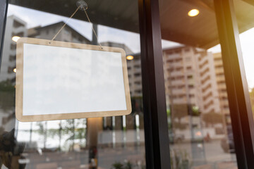 Empty white retail store sign on blurry background. advertising concept. mock up, 3d rendering