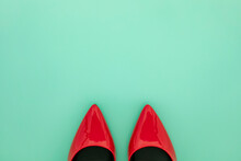 Red Women Shoes On Mint Green Background