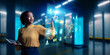 © metamorworks - A female engineer in the near future who operates a hologram screen
