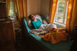 © ADDICTIVE STOCK - Paralyzed elderly lady lying on bed at home