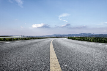 Wall Mural - Road and city buildings landscape skyline