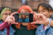 Group Of Women Taking Selfie Photo On Smartphone