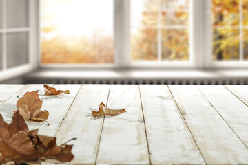 Wall Mural - Table background and autumn window. 