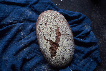 Wall Mural - artisan rye bread on table