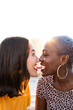© ADDICTIVE STOCK - Romantic lesbian couple sharing snack outdoors
