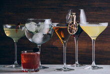 Set of alcohol cocktails in glasses on table