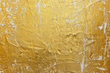 Textured Golden Stucco Background With Scratches