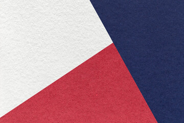 texture of craft navy blue, white and ruby shade color paper background, macro. vintage abstract ind