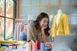© Surapong - A new generation young woman designers is using computer and new technology to make them design and create their own brand.
