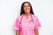 black pretty woman with cheerful and rebellious attitude, joking and sticking tongue out. nurse concept