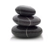 canvas print picture - three beautiful shiny black river stones stacked on top of each other with a shadow at the base