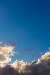 Poster - Clouds in dramatic blue sky	