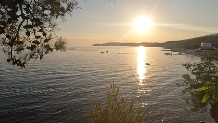 Canvas Print - Majestic summer sunset or sunrise landscape over seascape horizon. Sunlight reflection on water surface. Amazing landscape. 4K footage.