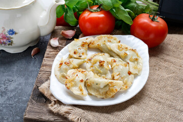 Poster - A portion of traditional polish dumplings.