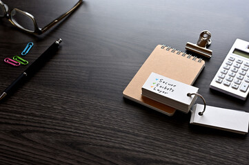 Poster - there is word card with the word secure socket layer on the desk.