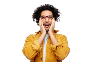 Wall Mural - people, emotion and expression concept - happy smiling man in glasses and yellow jacket holding to his face over white background