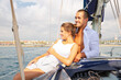 © JackF - Portrait happy couple sailing on sailboat in calm blue sea along Spanish coast during romantic summer vacation